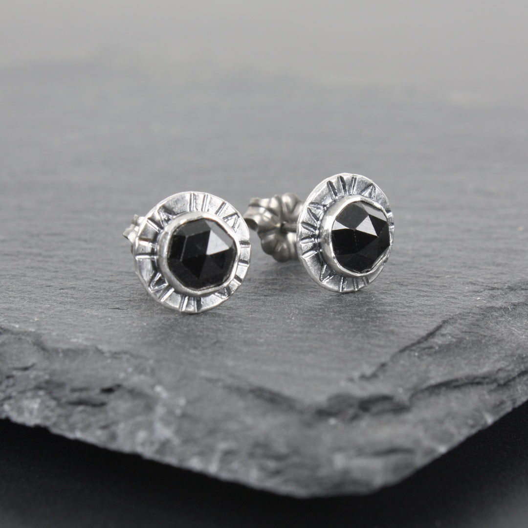 Sterling silver earrings with faceted rose-cut black spinel.