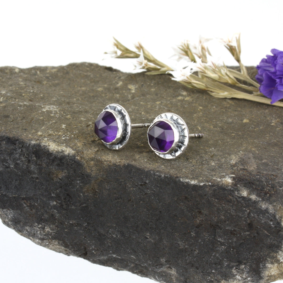 Sterling silver earrings with faceted rose-cut amethyst.