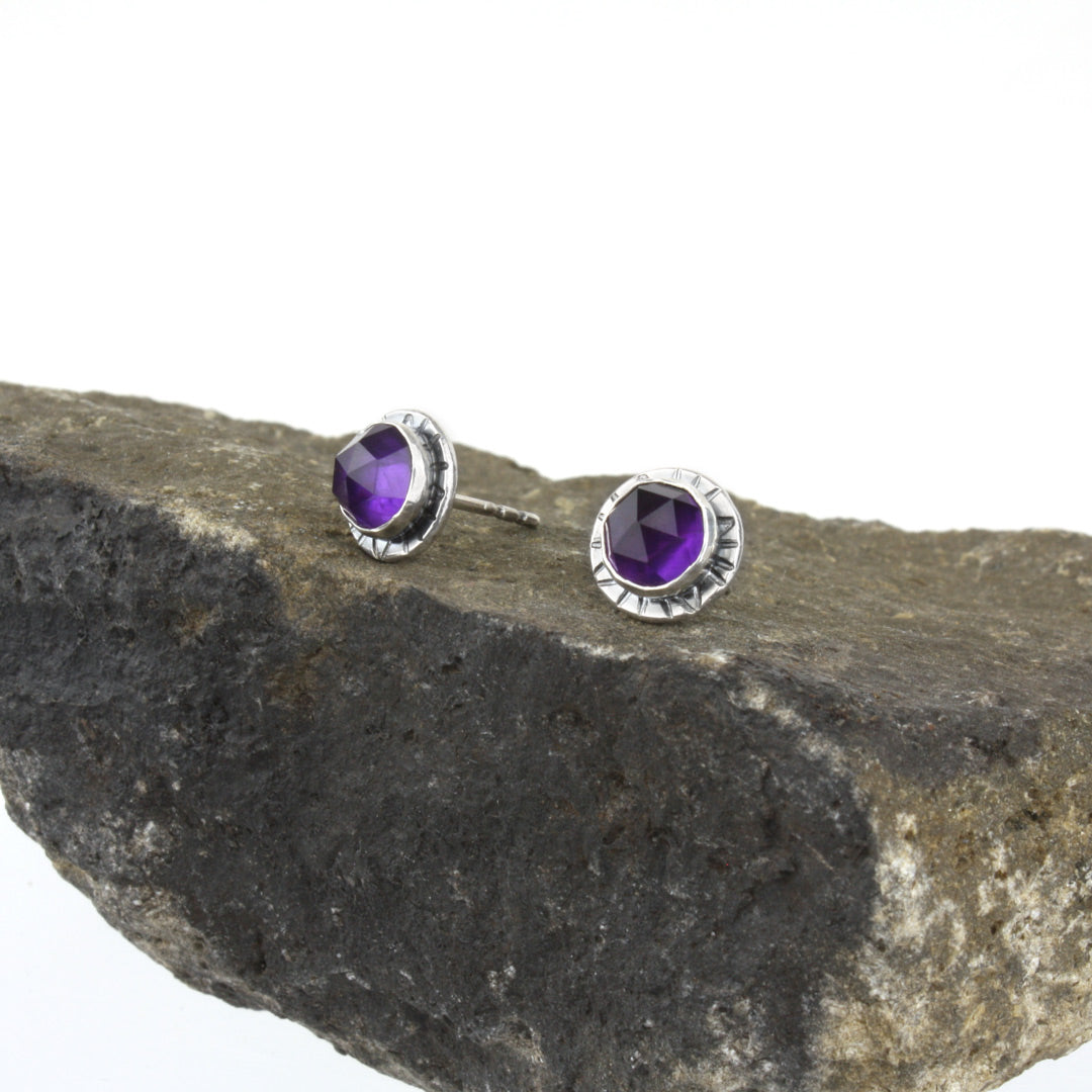 Sterling silver earrings with faceted rose-cut amethyst.