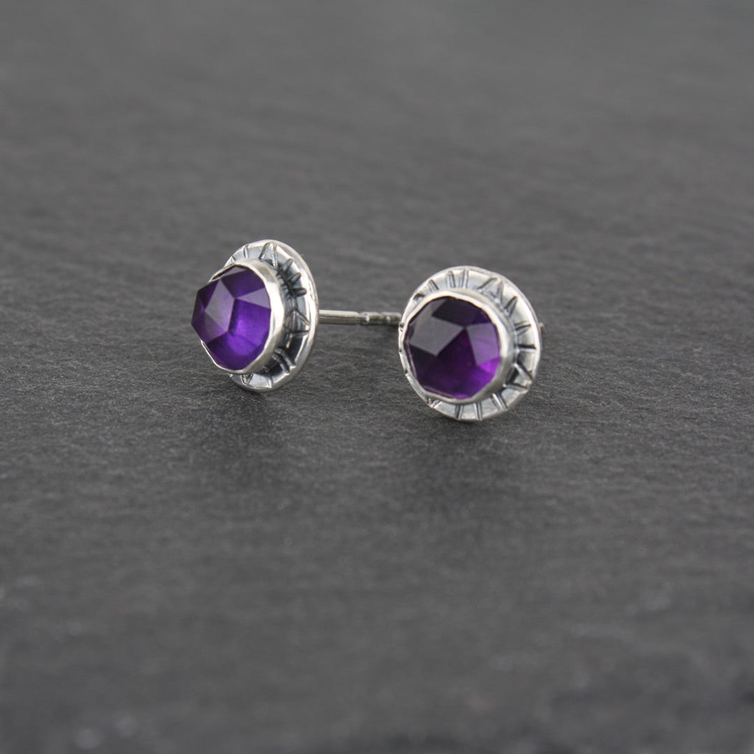 Sterling silver earrings with faceted rose-cut amethyst.