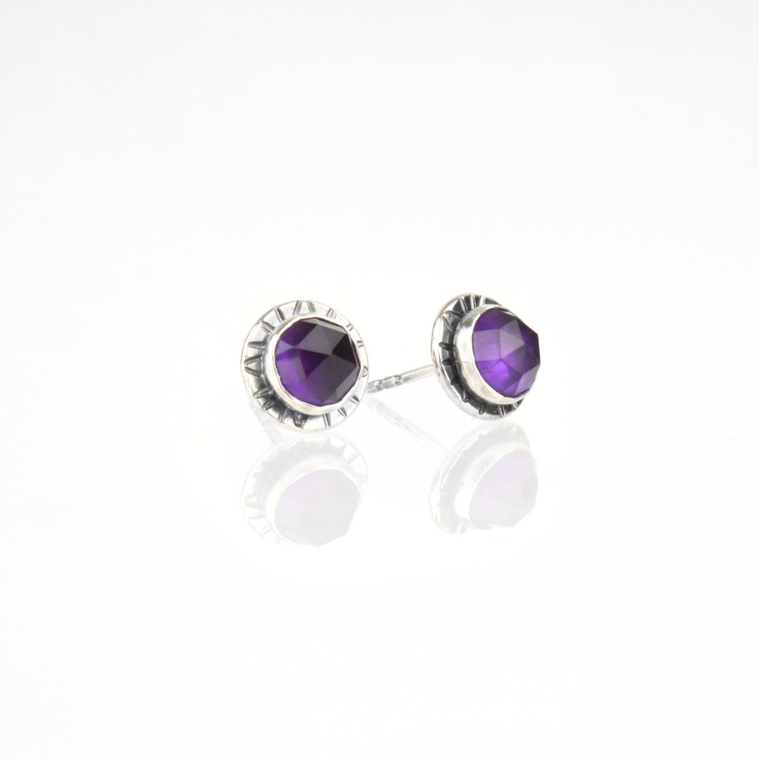 Sterling silver earrings with faceted rose-cut amethyst.