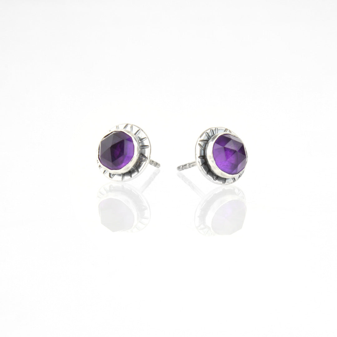 Sterling silver earrings with faceted rose-cut amethyst.
