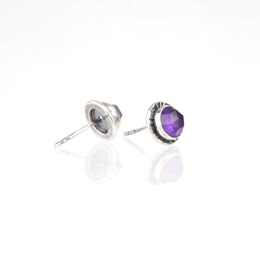Sterling silver earrings with faceted rose-cut amethyst.