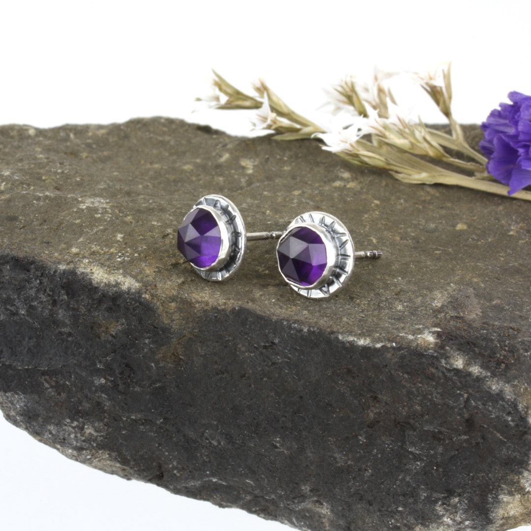 Sterling silver earrings with faceted rose-cut amethyst. 
