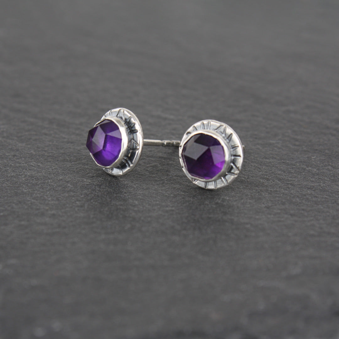 Sterling silver earrings with faceted rose-cut amethyst. 