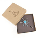 Snowflake Brooch with Deep Blue Spinel